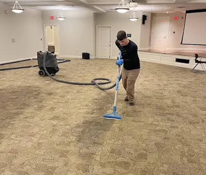 A restoration technician extracting water in a water damaged Kannapolis, NC home