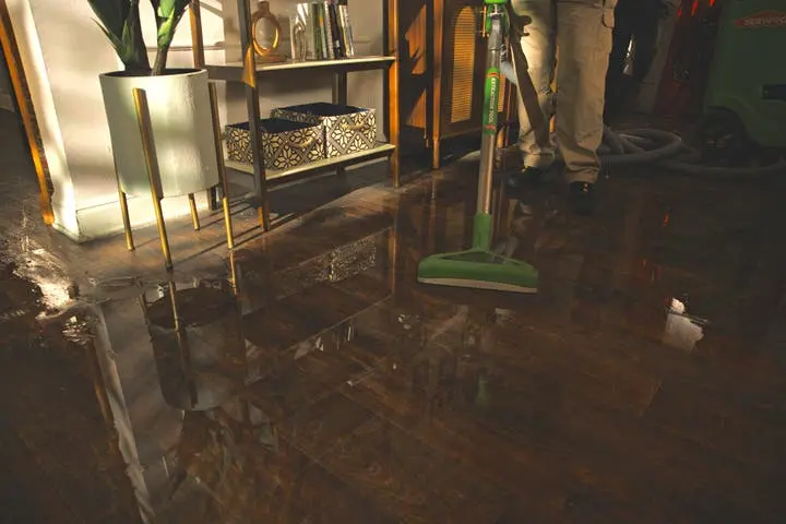 Water extraction of standing water from a floor in a Kannapolis, NC home